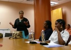 Prevention Coordinator Maren Roebuck (standing) talks about two new videos tackling underage drinking at their premier Monday on St. Croix. Prevention Coordinator Maren Roebuck (standing) talks about two new videos tackling underage drinking at their premier Monday on St. Croix.